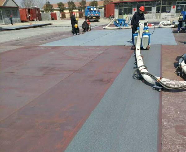 圖二,路面拋丸機清理大型鋼板 圖二,路面拋丸機清理大型鋼板